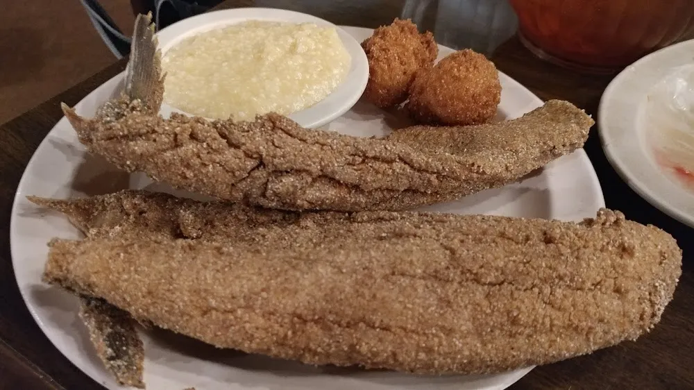 Mullet with Cheese Grits and Hush Puppies